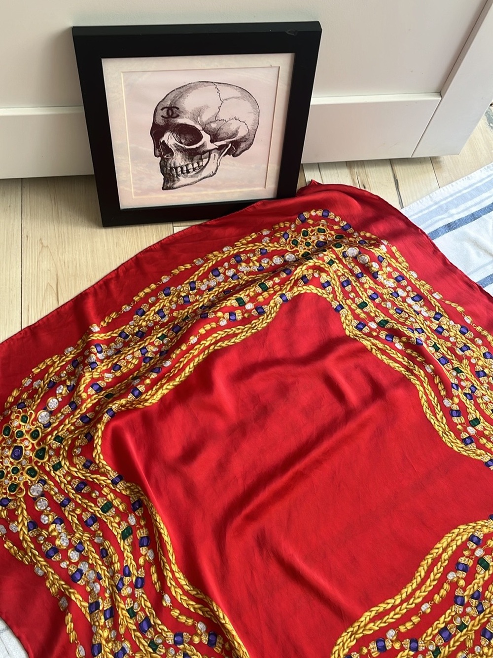 CHANEL Red Silk Scarf with Gold Chain and Jeweled Motif